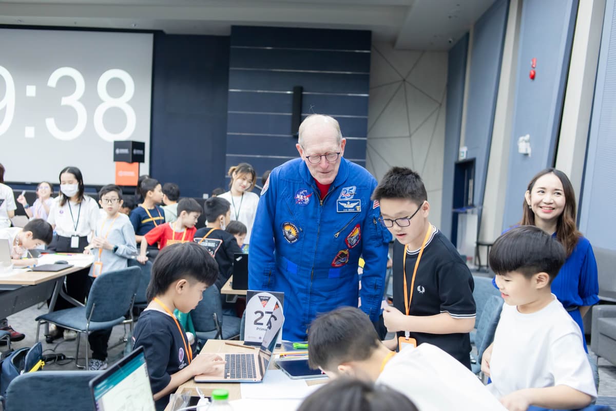 Image of a girl in front of a space exhibition