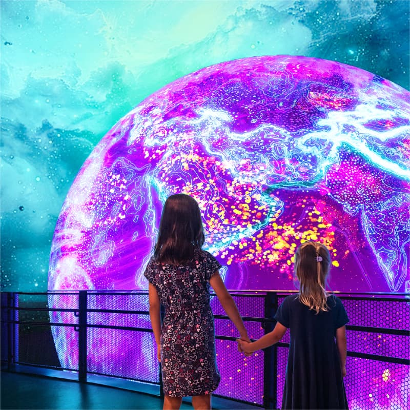 Image of a girl in front of a space exhibition